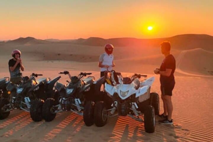 Abu Dhabi Desert Quad Bike Tour — Private Dune Ride, Camel & Sandboarding photo 3