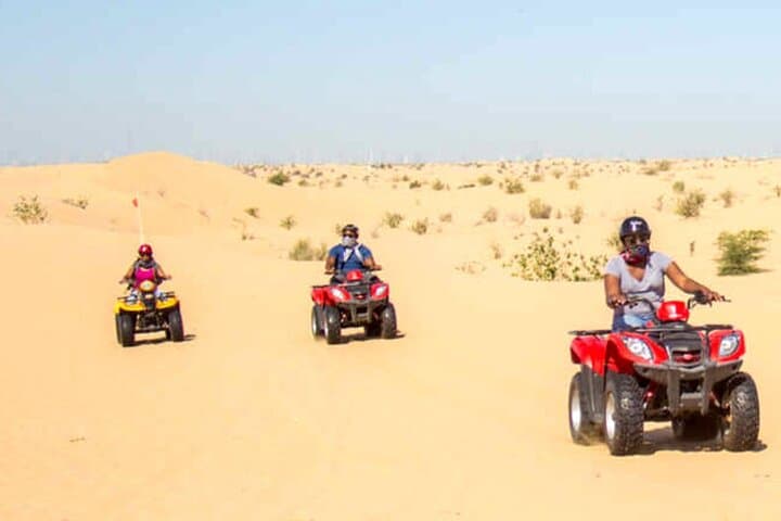 Abu Dhabi Desert Quad Bike Tour — Private Dune Ride, Camel & Sandboarding