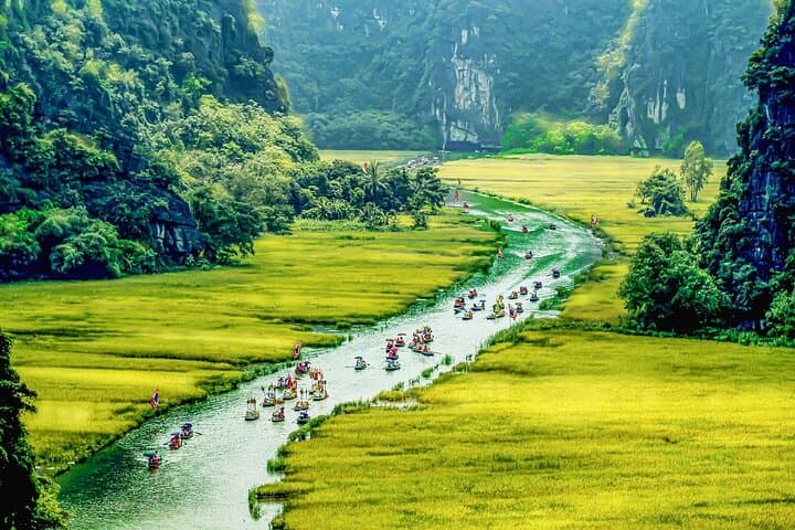 Ninh Binh Full-Day: Hoa Lu, Tam Coc Boat Ride & Mua Cave Climb with Cycling