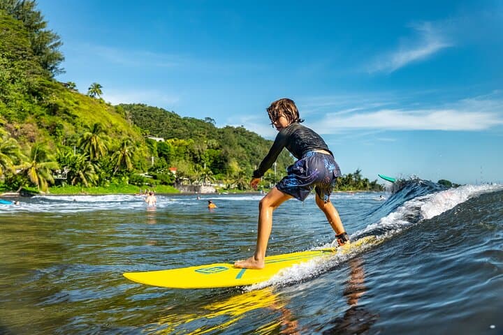 Ride Warm Waves: Group Guided Surfing Lessons on Tahiti's Black-Sand East Coast