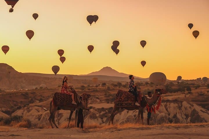 Camel Ride Through Cappadocia’s Fairy Chimneys: Sunrise Views & Local Character