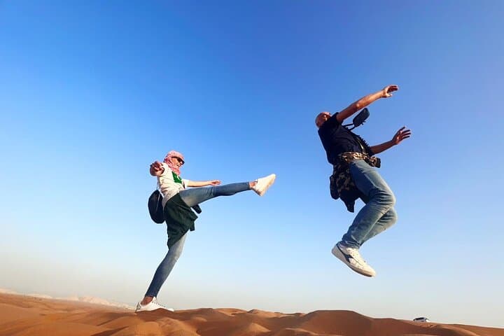 Dubai Red Dunes Safari: ATV Quad, Camel Ride & Desert BBQ Experience photo 2