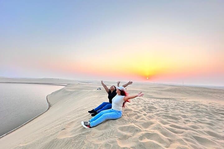 Dune Bashing to the Inland Sea: Doha Desert Safari with Camel Ride and Sandboarding photo 1