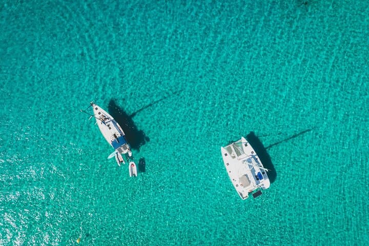Private Catamaran Day Trip from Cala Jondal to Es Vedrá — Ibiza Lagoon 400 Charter photo 3