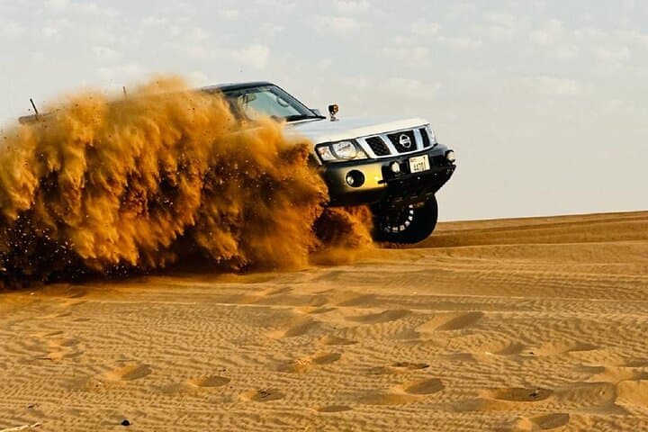Dubai Desert Safari: Dune Bashing, Camel Ride & BBQ Dinner Experience