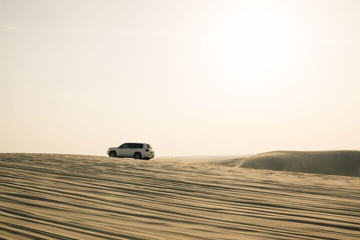 Doha Half-Day Desert Safari — Dune Bashing, Camel Ride & Sand Boarding photo 2