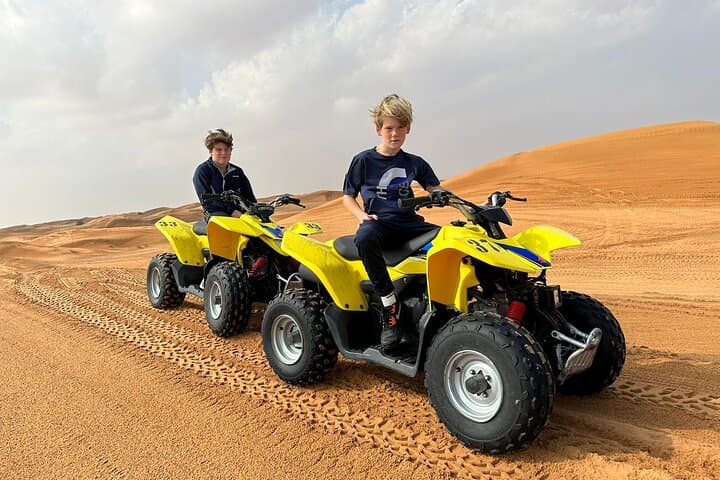 Dubai Desert Quad Bike Adventure: Guided ATV Ride & Camel Farm Visit photo 2
