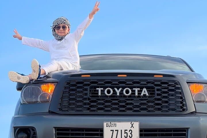 Dubai Desert Safari: Dune Bashing, Camel Ride & Sandboarding with Evening BBQ