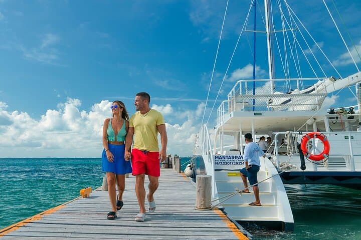 Catamaran to Isla Mujeres: Snorkel Reefs & Beach Club Day Trip from Cancún photo 2