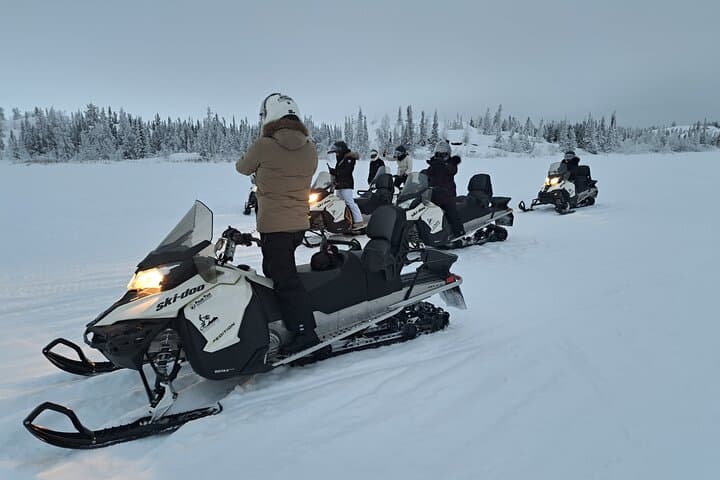 Explore Yellowknife’s Arctic Wilds on a Guided Snowmobile Adventure