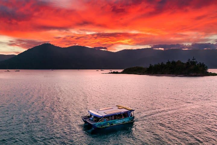 Airlie Beach Glass-Bottom Boat Sunset Tour: Scenic Whitsundays Evening Cruise