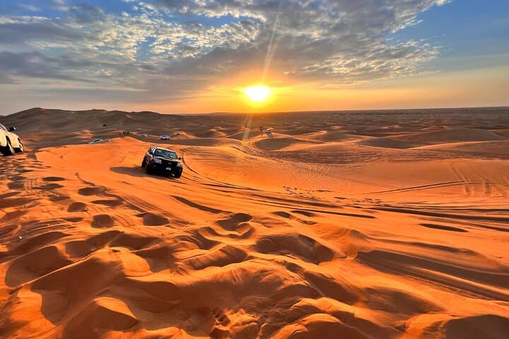 Morning Desert Safari Dubai: Dune Bashing, Sandboarding & Camel Ride photo 1
