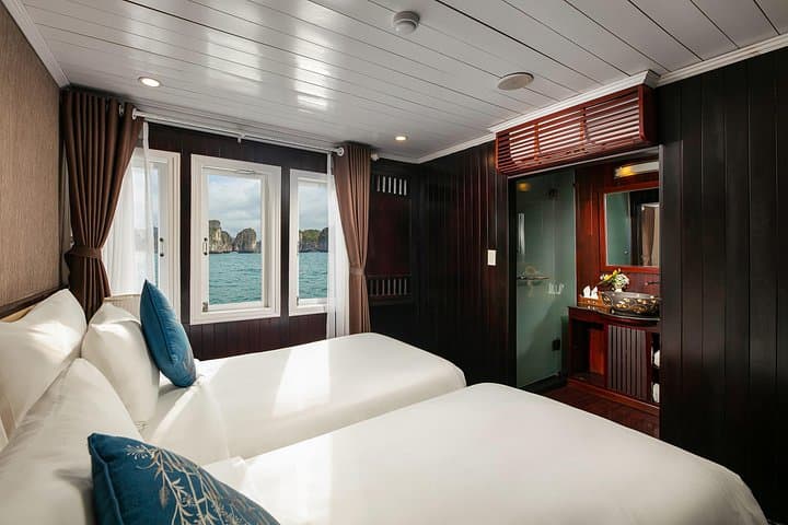 Bai Tu Long Bay Overnight Cruise: Quiet Kayaking, Caves & Floating Villages from Hanoi photo 3
