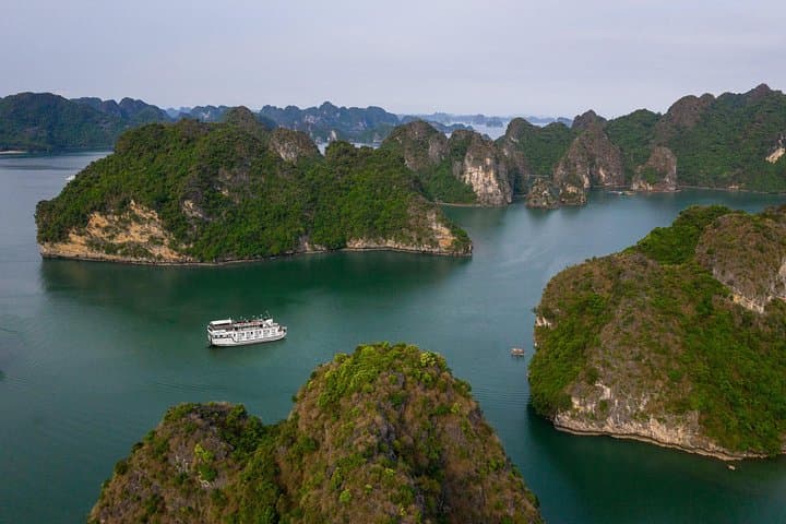Bai Tu Long Bay Overnight Cruise: Quiet Kayaking, Caves & Floating Villages from Hanoi photo 1