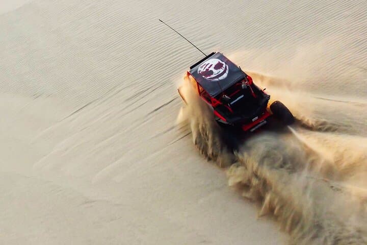 Doha Night Desert Safari: Dune Bashing, Sandboarding & Camel Ride