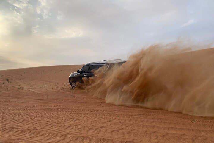 Evening Desert Safari in Dubai: Dune Bashing, BBQ & Live Shows photo 5