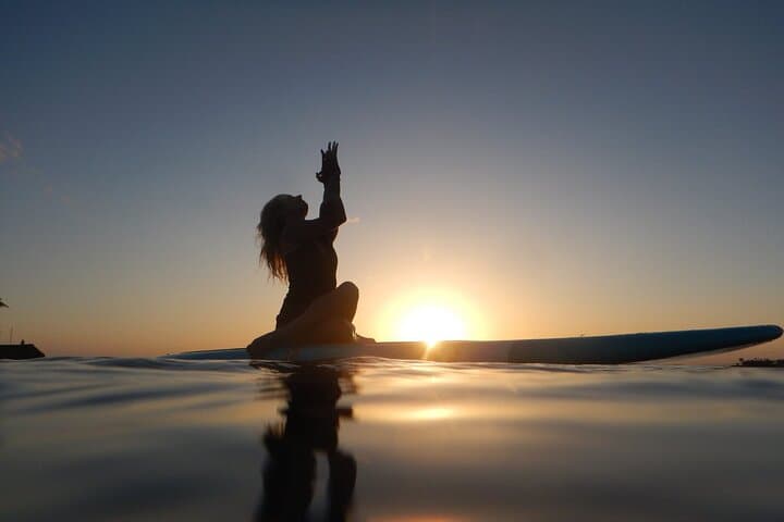 Sunset SUP Yoga at Magic Island: Paddleboard Flow in Oahu's Golden Hour