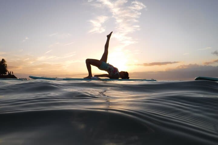 Sunset SUP Yoga at Magic Island: Paddleboard Flow in Oahu's Golden Hour photo 5