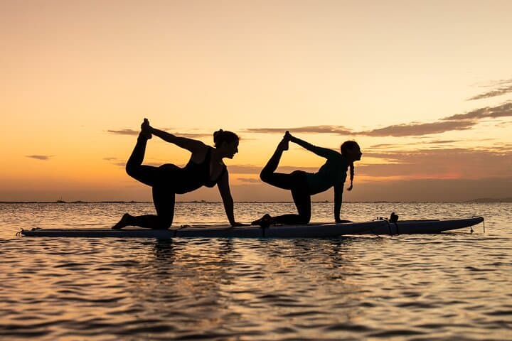 Sunset SUP Yoga at Magic Island: Paddleboard Flow in Oahu's Golden Hour photo 6