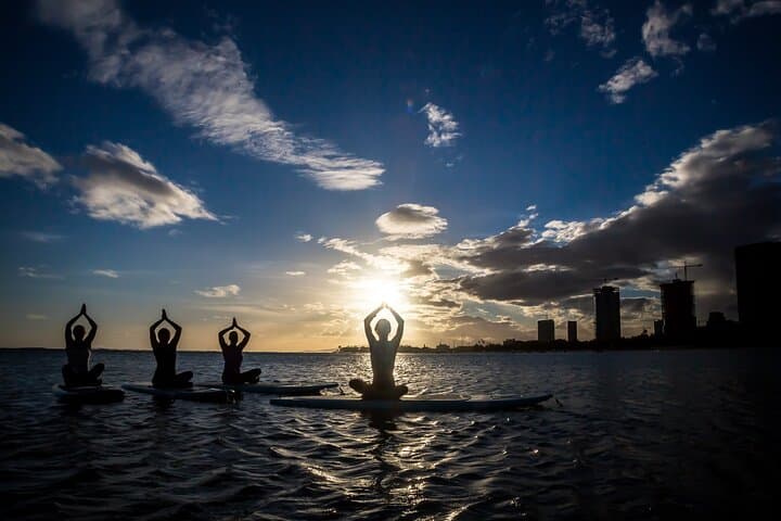 Sunset SUP Yoga at Magic Island: Paddleboard Flow in Oahu's Golden Hour photo 3
