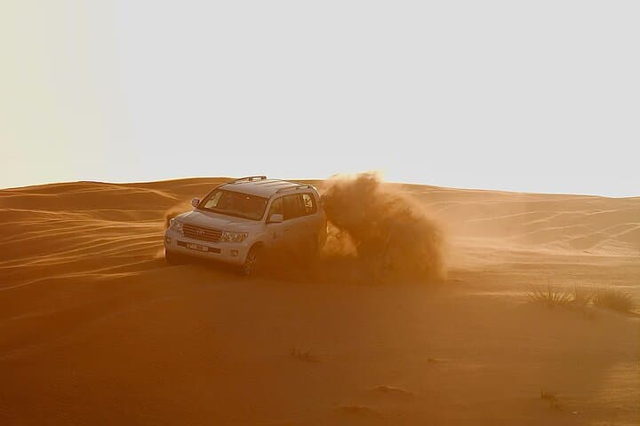 Dubai Morning Desert Safari: Camel Ride, Dune Bashing & Sandboarding