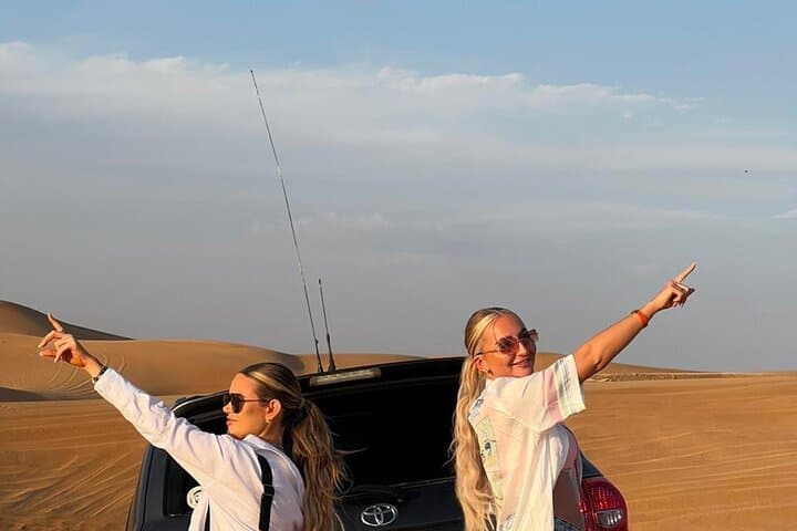 Abu Dhabi Evening Desert Safari: Dune Bashing, BBQ & Live Shows photo 3
