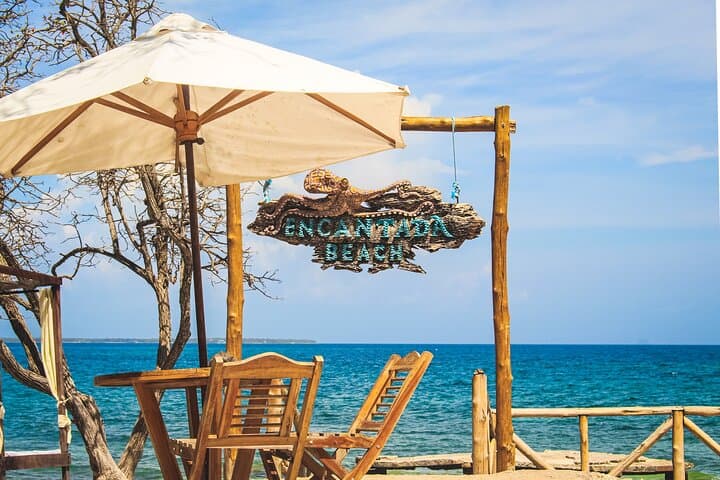 Private Full-Day Isla Encantada: Snorkel, Paddle & Hidden Beaches in the Rosario Islands photo 2