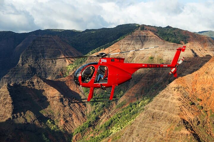 Experience Kauai’s Untamed Beauty with a Doors-Off Hughes 500 Helicopter Flight