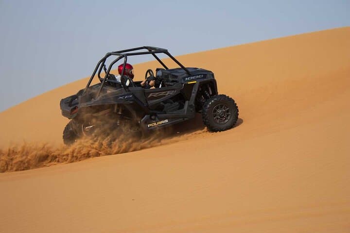 Dubai desert buggy dune bashing, sandboarding, camel ride & Bedouin camp experience photo 5