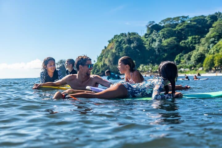 Ride Warm Waves: Group Guided Surfing Lessons on Tahiti's Black-Sand East Coast photo 2