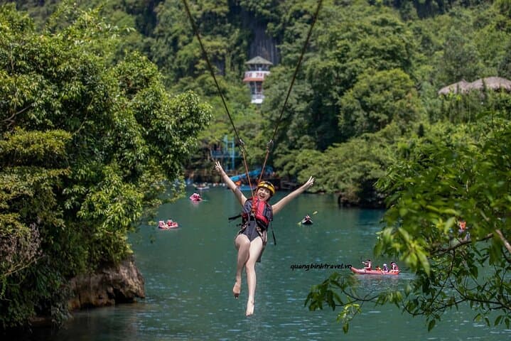 Paradise Cave and Dark Cave Zipline: Full-Day Dong Hoi Adventure