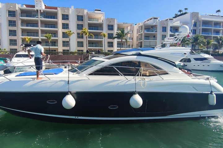 Cancun to Isla Mujeres: 6-Hour Luxury Sunseeker Yacht Charter photo 3
