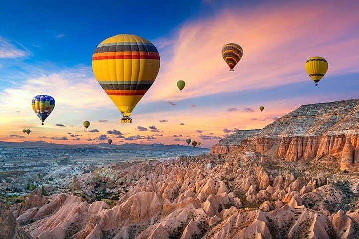 Dawn Over Fairy Chimneys: Hot Air Balloon Flight in Cappadocia