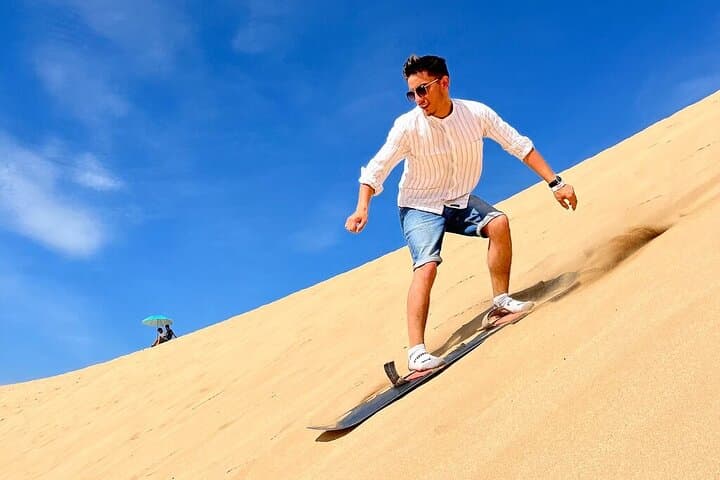 Sandboarding & Quad Biking on the Agadir Dunes: Guided Half-Day Adventure