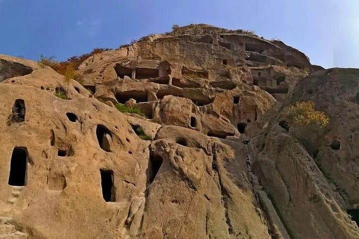 Day Trip to Longqing Gorge & Guyaju Caves: Cruise the Ravine and Explore Ancient Cliff Dwellings photo 4