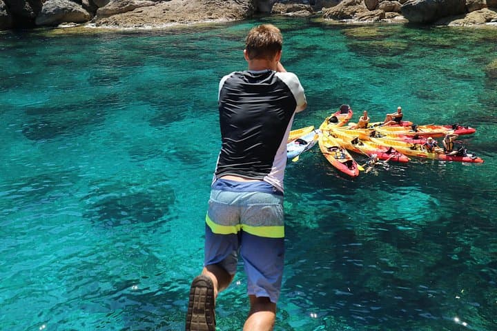 Kayak and Coasteering in Cala Sant Vicenç: Cliff Jumps, Snorkel & Deep-Water Soloing