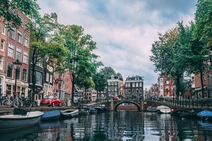 Amsterdam Self-Guided GPS Walking Tour: Dam Square, Red Light District & Historic Highlights