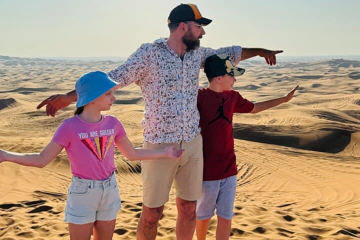 Morning Red Dune Safari Dubai: Sandboarding, Dune Bashing & Camel Ride photo 5