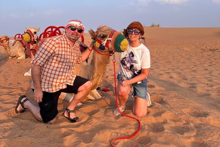 Dubai Red Dune Safari: Camel Ride, Sandboarding & BBQ Sunset Experience