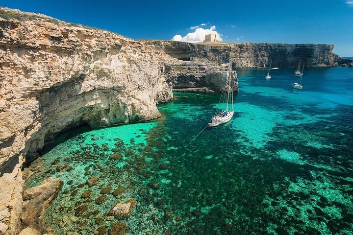 Three Bay Cruise from Mellieha: Blue Lagoon, Crystal Lagoon & Ħalfa Rock