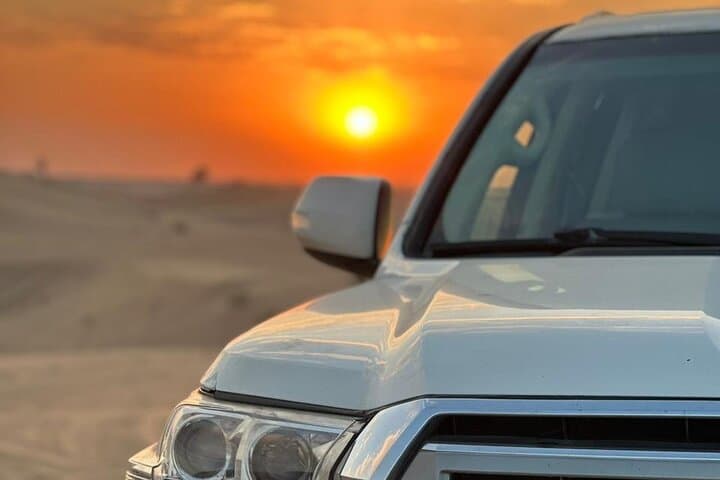 Sunrise Dubai Desert Safari: Private Camel Ride, Dune Bashing & Sandboarding photo 6