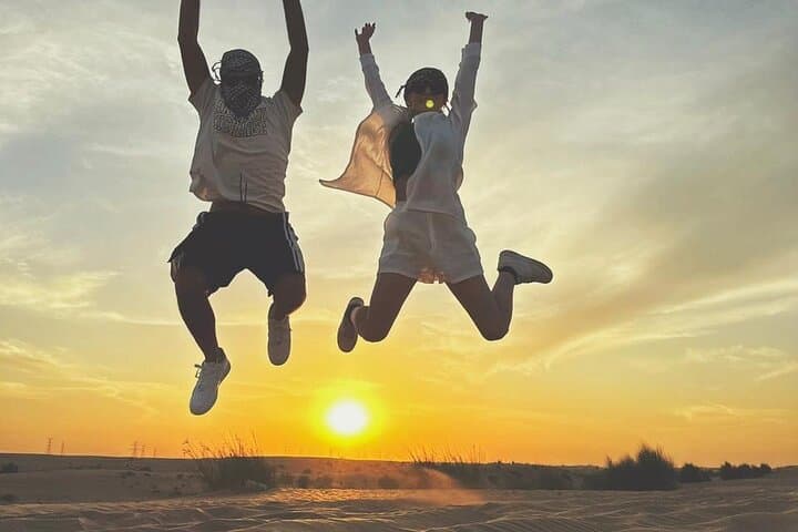 Sunrise Dubai Desert Safari: Private Camel Ride, Dune Bashing & Sandboarding photo 5