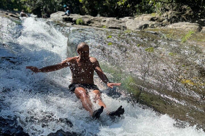 El Yunque Waterslide & Waterfall Tour from San Juan — Natural Rock Slides and Local Food photo 3