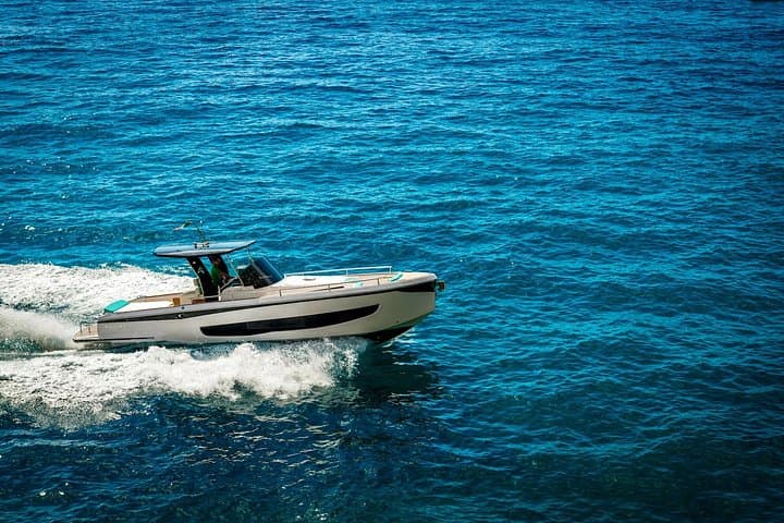 Private Capri Full-Day Boat Tour: Blue Grotto, Faraglioni & Coastal Villas photo 1