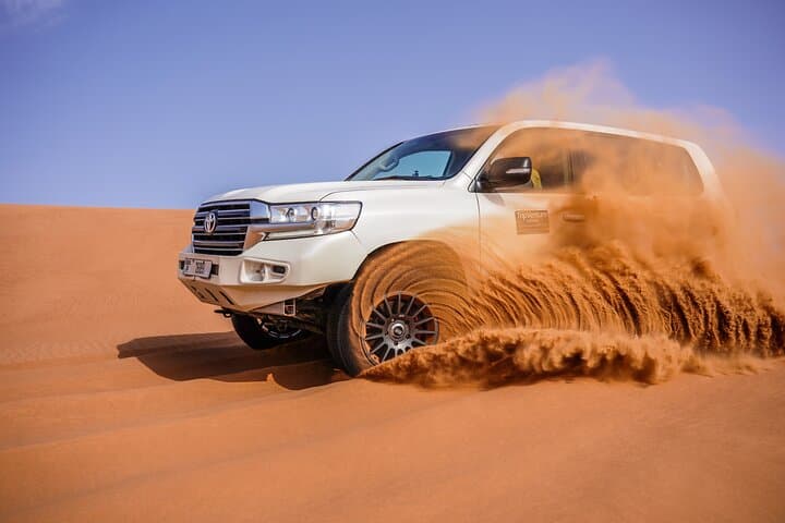 Dubai Morning Desert Safari & Quad Bike Adventure — Dune Bashing, Sandboarding & Camel Ride photo 4