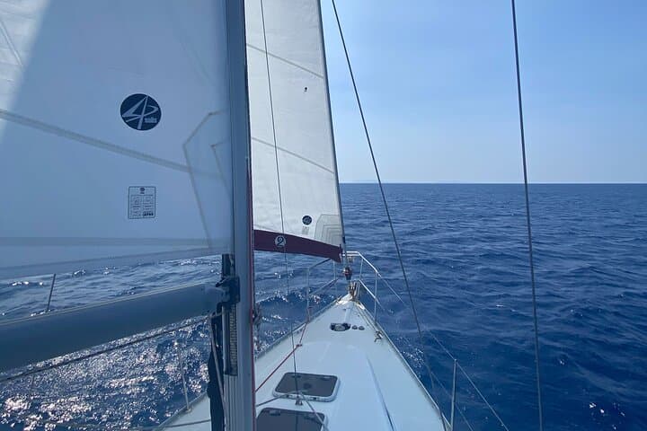 Private Half-Day Sailing in Santorini: Swim Volcanic Beaches, Dine at Sunset photo 4