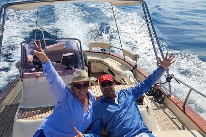 Capri Private Boat Tour from Positano or Praiano — Full-Day Blue Grotto & Faraglioni Excursion photo 2