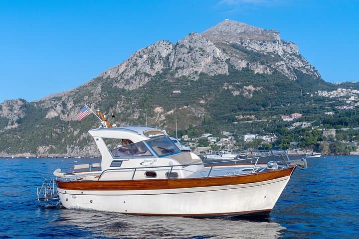 Positano to Amalfi: Scenic Boat Tour to the Emerald Grotto and Hidden Coves photo 1