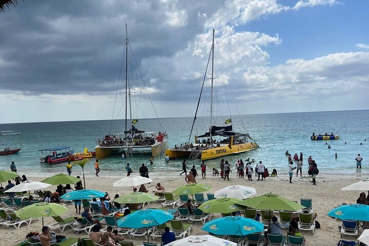 Negril Private Day Tour: ATV Ride, 7-Mile Party Catamaran & Rick's Cafe Sunset photo 3