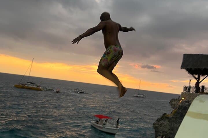 Negril Private Day Tour: ATV Ride, 7-Mile Party Catamaran & Rick's Cafe Sunset photo 4